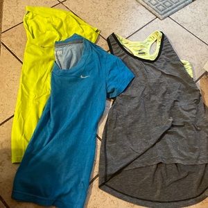 Three Nike tops